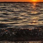 Sunrise over calm water, a new chapter at 60